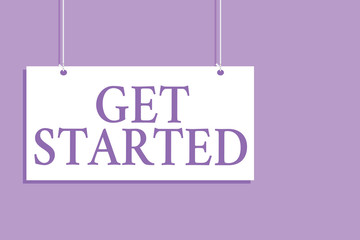Fototapeta premium Writing note showing Get Started. Business photo showcasing asking someone to begin task endeavour or process right now Hanging board message communication open close sign purple background