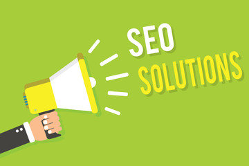Conceptual hand writing showing Seo Solutions. Business photo text Search Engine Result Page Increase Visitors by Rankings Man holding megaphone loudspeaker green background speaking loud