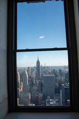 Fototapeta na wymiar Looking South from a window on the top of Manhattans midtown (NYC, USA)