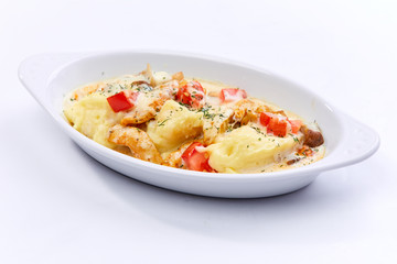chicken with mashed potato and tomatoes