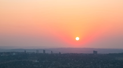 Naklejka premium Sunset from high Angle looking over Sandton and Randburg area of Johannesburg South Africa