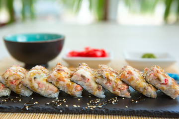 Sushi roll sushi with fish, cream cheese and vegetables. Sushi menu. Japanese food Healthy and tasty food.