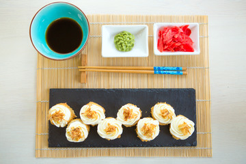 Hot fried Sushi Roll with salmon cheese. Sushi menu. Japanese food Healthy and tasty food.