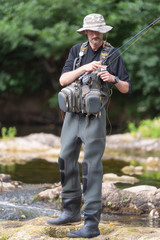 Fototapeta premium Pro fishermen with fishing rod, hobby and sport activity . 