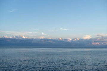 Naklejka na ściany i meble Mediterranean sea under cloudy sky