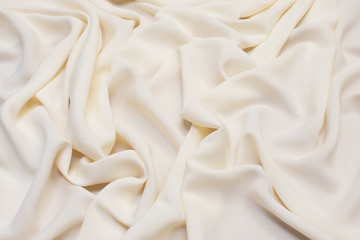 The texture of the synthetic fabric is pink. Background, pattern.