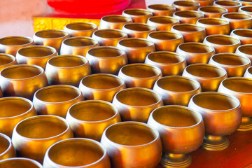 Group of alms bowls for donation