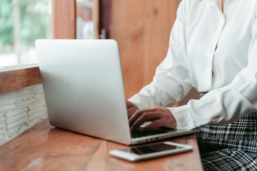 Women are working in cafe 