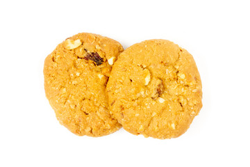 Oatmeal raisin cookies isolated on white background, top view.