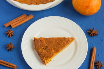 delicious fresh homemade pumpkin pie on blue background