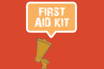 Text sign showing First Aid Kit. Conceptual photo Set of materials and tools used for giving emergency treatment.