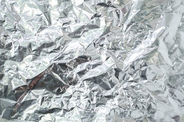 Close up of wrinkle silver foil as background. Freud sheet.