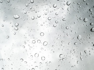 Drops of water on glass . Selective focus. white background