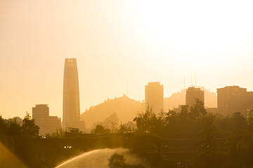Fototapeta na wymiar Skyline of buildings in Las Condes district from Parque Araucano, Santiago de Chile