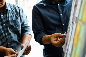 user experience UX designer designing web on smart phone layout. UI developer planning working on mobile application prototype