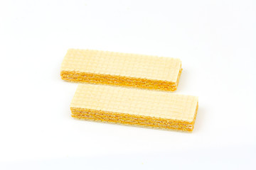 Crispy cheese flavored wafer snack isolated on white background.
