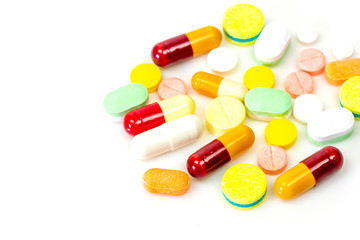Colorful medicine pills isolated on white background.