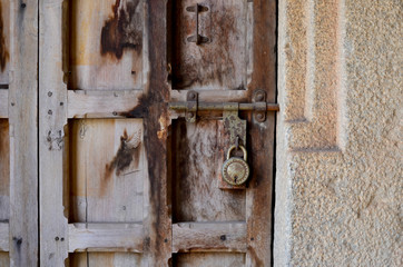 Fototapeta na wymiar Old doors with padlocks