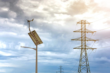 lantern with a lantern and installed solar panels on a blue sky background.