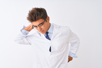 Young handsome sciencist man wearing glasses and coat over isolated white background Suffering of neck ache injury, touching neck with hand, muscular pain