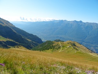 Nature, meadows and peaks that characterize the landscape of the Italian Alps in Val di Susa, near the town of 