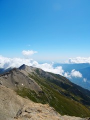 Nature, meadows and peaks that characterize the landscape of the Italian Alps in Val di Susa, near...