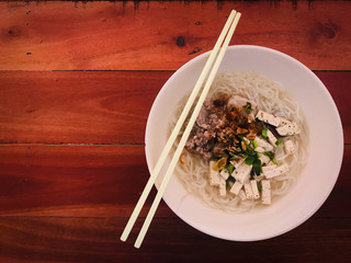 Delicious of Vietnamese noodle soup .on Wooden table..