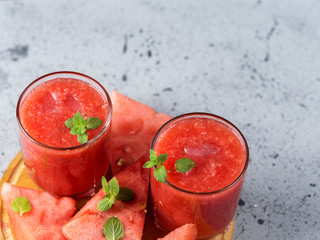 Two glasses of healthy fresh watermelon smoothie . Summer dessert