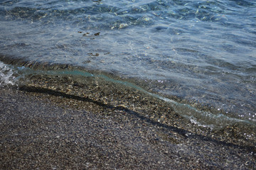 Light surf on a sandy beach