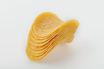 Potato chips isolated white background. Side view.