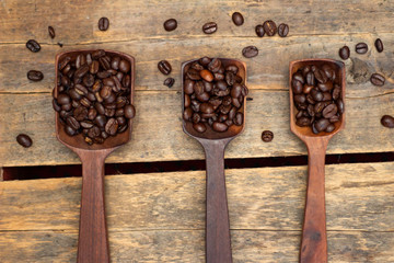 Coffee Beans in Wooden Scoops