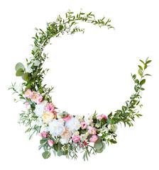 Circle frame from branches, leaves and flowers. Wreath from plants and roses isolated on white. Wedding decorations. Romantic decorations from flowers
