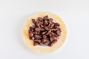 Top centered shoot of tasty meat on small plate with clear white background.photo is taken in turkey.