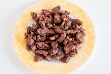 Top shoot of tasty meat on small plate with clear white background.photo is taken in turkey.
