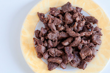 Clear shoot of tasty meat on small plate with white background.photo is taken in turkey.