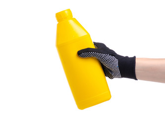 Yellow bottle industrial primer in hand on white background isolation