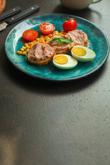 Breakfast snack, tasty food (pate, toast, tomato, corn, egg, coffee). top view. food background. copy space