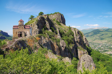 Fototapeta na wymiar Shoana Church. Christian church was built at the end of 10th century (Alania). Is located on southeastern spur of Mount Shoan. Russia. North Caucasus, Karachay-Cherkessia