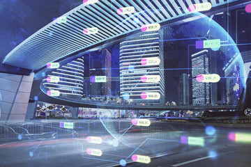 Data theme hologram drawing on city view with skyscrapers background multi exposure. Bigdata concept.