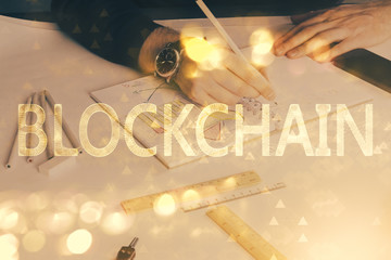 Man's hands working with notes background. Cryptocurrency and finance concept.