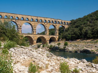 Fototapeta premium France, July 2019: The beautiful nature of southern France with its famous landmark roman bridge Pont du Gard, located near Avignon