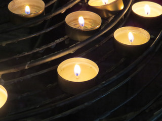 lighted candles in the church