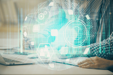 Social network theme hologram with businessman working on computer on background. Concept of world wide web. Double exposure.