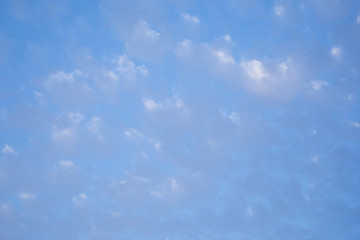 Blue sky with grey and white clouds. Sky background
