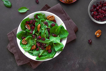 Salad with pecan nuts and dry cranberries