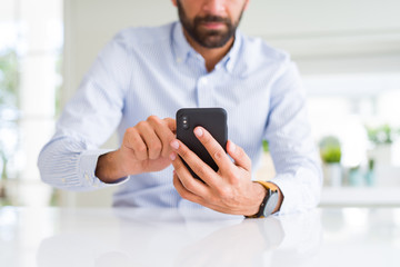 Close up of man using smartphone