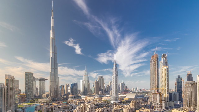 Dubai Downtown skyline timelapse with Burj Khalifa and other towers paniramic view from the top in Dubai