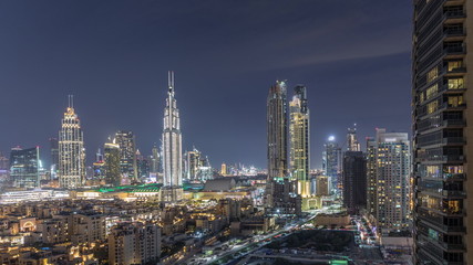 Beautiful skyline of Dubai downtown and Business bay with modern architecture night timelapse.