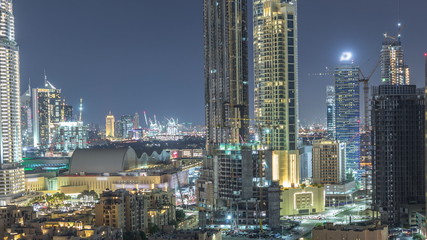 Beautiful skyline of Dubai downtown and Business bay with modern architecture night timelapse.