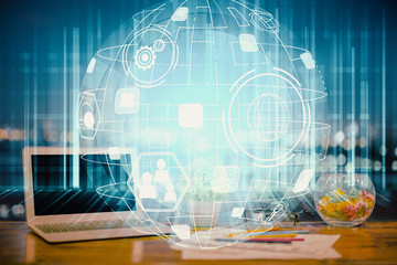 Computer on desktop with social network hologram. Double exposure. Concept of international people connections.